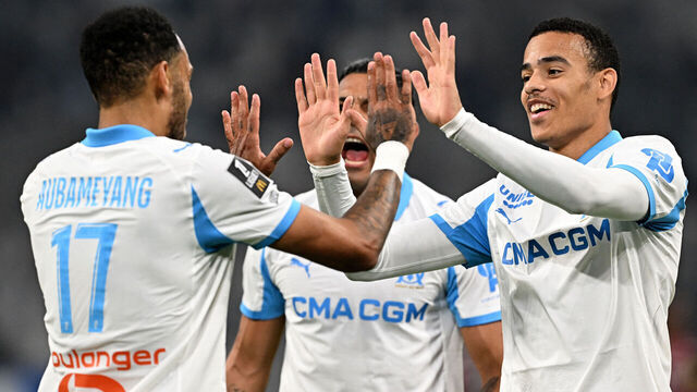 Marseille's Gabonese forward #17 Pierre-Emerick Aubameyang is congratulated by Marseille's English forward #10 Mason Greenwood (R) after scoring a goal during the French L1 football match between Olympique de Marseille (OM) and Metz FC at the Stade Velodrome in Marseille, southern France on April 10, 2026.
