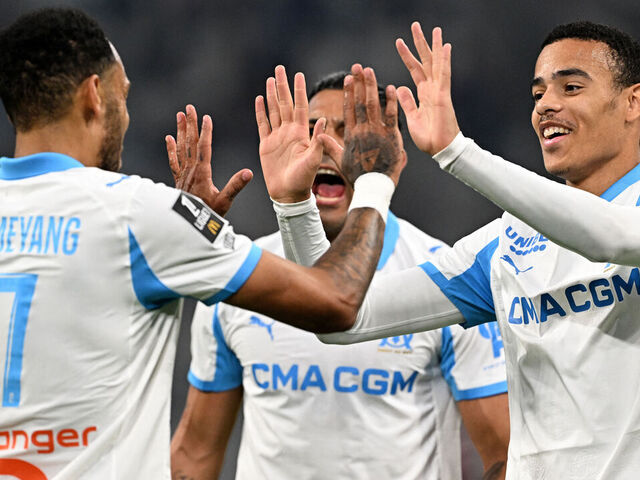 Marseille's Gabonese forward #17 Pierre-Emerick Aubameyang is congratulated by Marseille's English forward #10 Mason Greenwood (R) after scoring a goal during the French L1 football match between Olympique de Marseille (OM) and Metz FC at the Stade Velodrome in Marseille, southern France on April 10, 2026.
