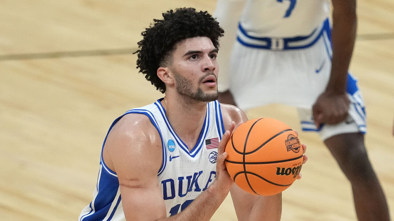 WASHINGTON, DC - MARCH 29: Cameron Boozer #12 of the Duke Blue Devils takes a foul shot during the Elite 8 of the 2026 NCAA Men's Basketball Tournament game against the Connecticut Huskies at Capital One Arena on March 29, 2026 in Washington, DC.