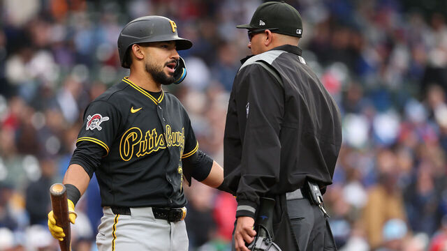 CHICAGO, ILLINOIS - APRIL 10: Nick Gonzales #3 of the Pittsburgh Pirates argues with home plate umpire Roberto Ortiz #40 against the Chicago Cubs at Wrigley Field on April 10, 2026 in Chicago, Illinois.