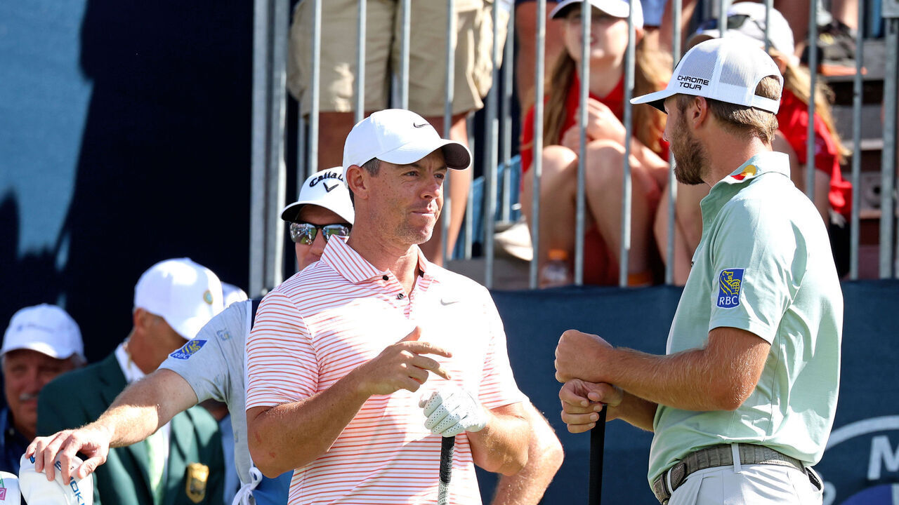 CASTLE ROCK, CO - AUGUST 24: PGA golfers Rory McIlroy and Sam Burns talk while waiting on the first tee during the third round of the PGA FedExCup BMW Championship on August 24th, 2024, at Castle Pines Golf Club in Castle Rock, Colorado.