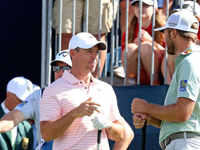 CASTLE ROCK, CO - AUGUST 24: PGA golfers Rory McIlroy and Sam Burns talk while waiting on the first tee during the third round of the PGA FedExCup BMW Championship on August 24th, 2024, at Castle Pines Golf Club in Castle Rock, Colorado.