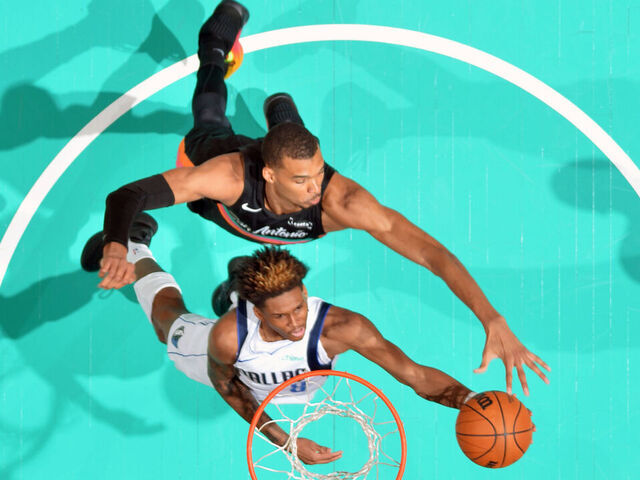 SAN ANTONIO, TX - APRIL 10: AJ Johnson #8 of the Dallas Mavericks drives to the basket during the game against the San Antonio Spurs on April 10, 2026 at the Frost Bank Center in San Antonio, Texas. Mandatory Copyright Notice: Copyright 2026 NBAE (Photos by Michael Gonzales/NBAE via Getty Images)