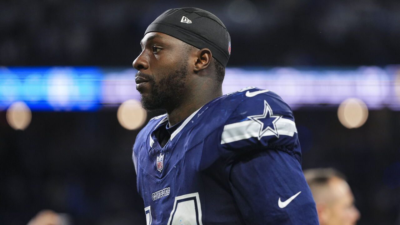 DETROIT, MI - DECEMBER 04: Markquese Bell #14 of the Dallas Cowboys exits the field after an NFL football game against the Detroit Lions at Ford Field on December 4, 2025 in Detroit, Michigan.