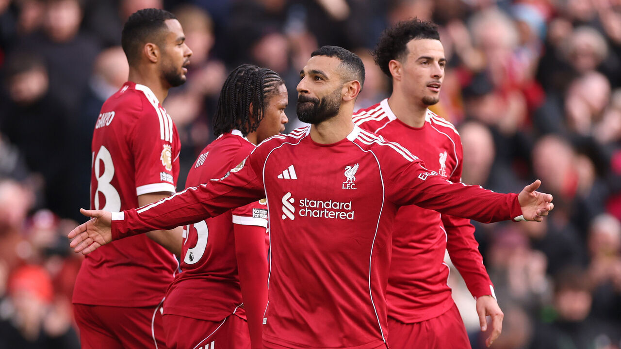 LIVERPOOL, ENGLAND - APRIL 11: Mohamed Salah of Liverpool celebrates scoring his team's second goal with teammates during the Premier League match between Liverpool and Fulham at Anfield on April 11, 2026 in Liverpool, England.