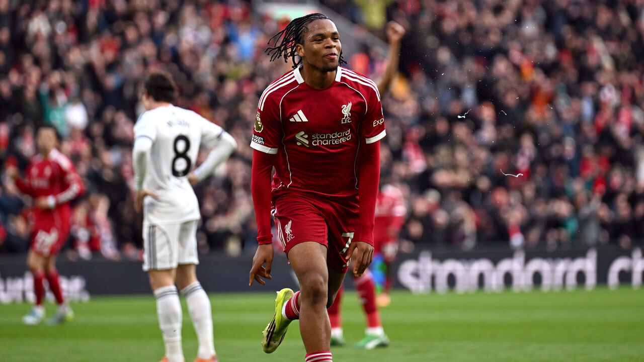 LIVERPOOL, ENGLAND - APRIL 11: Rio Ngumoha of Liverpool celebrates scoring his team's first goal during the Premier League match between Liverpool and Fulham at Anfield on April 11, 2026 in Liverpool, England.