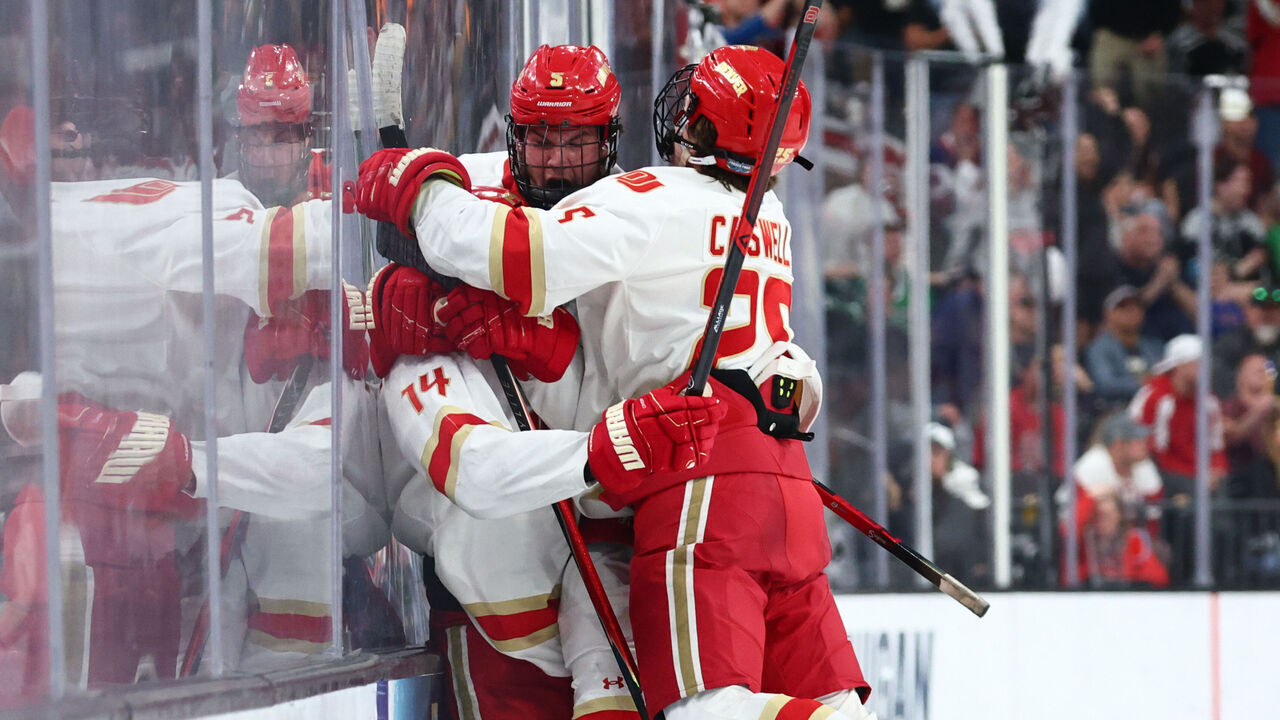 LAS VEGAS, NEVADA - APRIL 9: The Denver Pioneers react after a game-tying goal from Rieger Lorenz #14 of the Denver Pioneers during the Division I Men's Ice Hockey Championship against the Wisconsin Badgers held at T-Mobile Arena on April 9, 2026 in Las Vegas, Nevada.