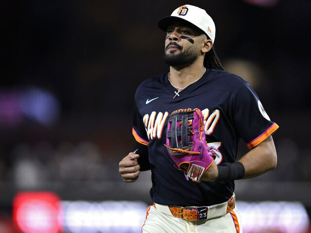 SAN DIEGO, CALIFORNIA - APRIL 10: Fernando Tatis Jr. #23 of the San Diego Padres runs to the dugout during the fourth inning against the Colorado Rockies at Petco Park on April 10, 2026 in San Diego, California.