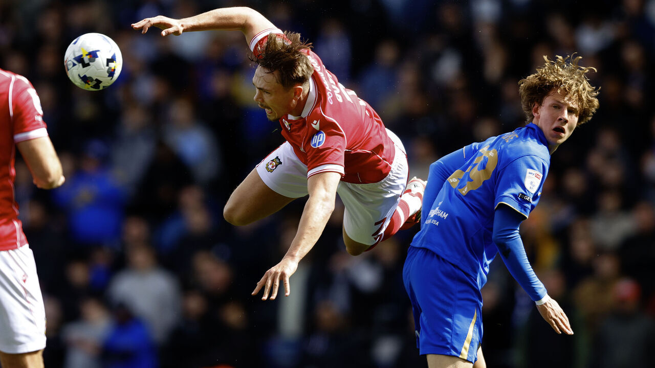 BIRMINGHAM, ENGLAND - APRIL 12: Callum Doyle of Wrexham competes with August Priske of Birmingham City during the Sky Bet Championship match between Birmingham City and Wrexham AFC at St Andrew’s at Knighthead Park on April 12, 2026 in Birmingham, England.