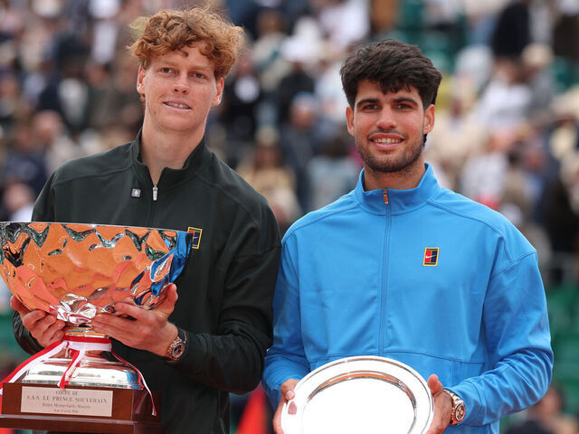 MONTE-CARLO, MONACO - APRIL 12: Jannik Sinner of Italy and Carlos Alcaraz of Spain pose for a photo with their winners and runners-up trophies after the Men's Singles Final during day eight of the Rolex Monte-Carlo Masters at Monte-Carlo Country Club on April 12, 2026 in Monte-Carlo, Monaco.
