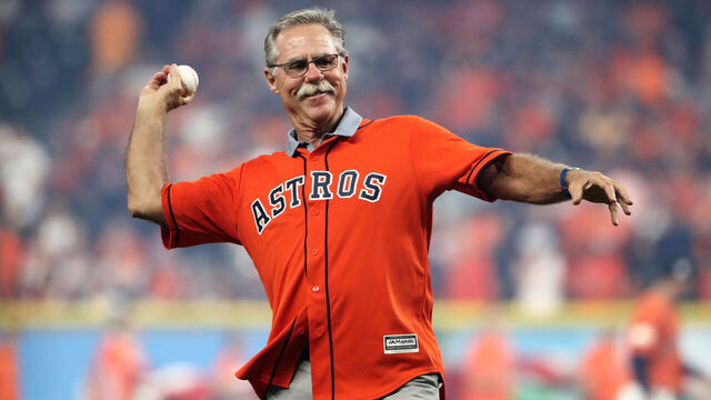 HOUSTON, TX - OCTOBER 13: Former Astro Phil Garner throws out the ceremonial first pitch for game one of the American League Championship Series between the Houston Astros and the New York Yankees at Minute Maid Park on October 13, 2017 in Houston, Texas.