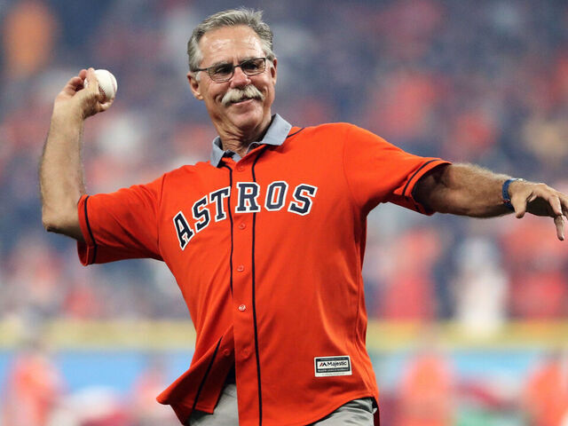 HOUSTON, TX - OCTOBER 13: Former Astro Phil Garner throws out the ceremonial first pitch for game one of the American League Championship Series between the Houston Astros and the New York Yankees at Minute Maid Park on October 13, 2017 in Houston, Texas.