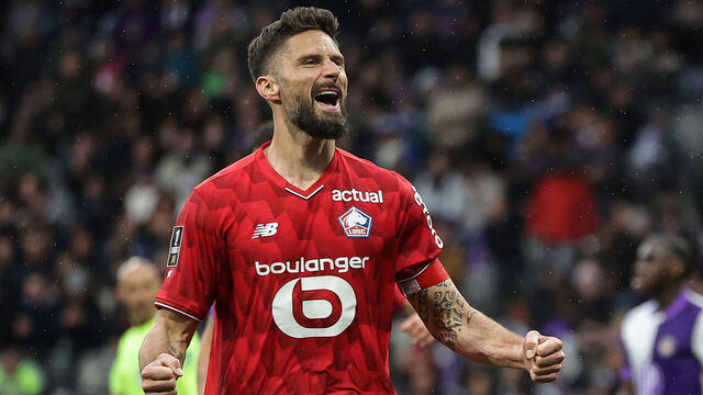 Lille's French forward #09 Olivier Giroud celebrates after scoring during the French L1 football match between Toulouse FC and Lille LOSC at the TFC Stadium in Toulouse, southwestern France, on April 12, 2026.