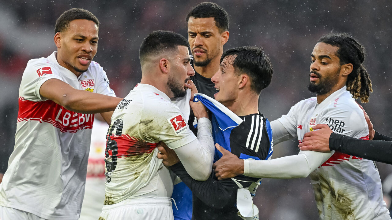 Stuttgart, Germany - April 12: Deniz Undav of VfB Stuttgart and Nicolás Capaldo of Hamburger SV hold each other tight during the Bundesliga match between VfB Stuttgart and Hamburger SV at MHPArena Stuttgart on April 12, 2026 in Stuttgart, Germany.