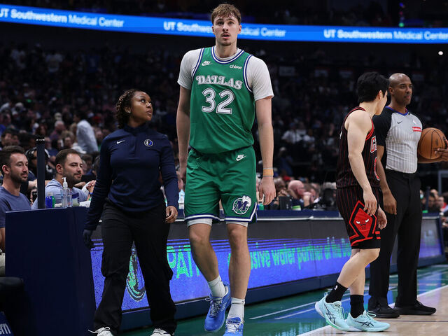 DALLAS, TEXAS - APRIL 12: Cooper Flagg #32 of the Dallas Mavericks leaves the game during the first half against the Chicago Bulls at American Airlines Center on April 12, 2026 in Dallas, Texas. NOTE TO USER: User expressly acknowledges and agrees that, by downloading and or using this photograph, User is consenting to the terms and conditions of the GettyImages License Agreement.