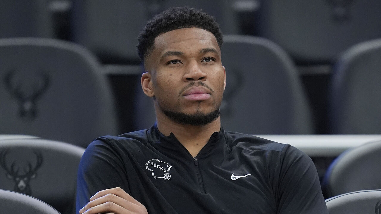 MILWAUKEE, WISCONSIN - APRIL 10: Giannis Antetokounmpo #34 of the Milwaukee Bucks sits by the court before a game against the Brooklyn Nets at Fiserv Forum on April 10, 2026 in Milwaukee, Wisconsin.