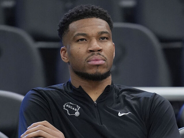 MILWAUKEE, WISCONSIN - APRIL 10: Giannis Antetokounmpo #34 of the Milwaukee Bucks sits by the court before a game against the Brooklyn Nets at Fiserv Forum on April 10, 2026 in Milwaukee, Wisconsin.
