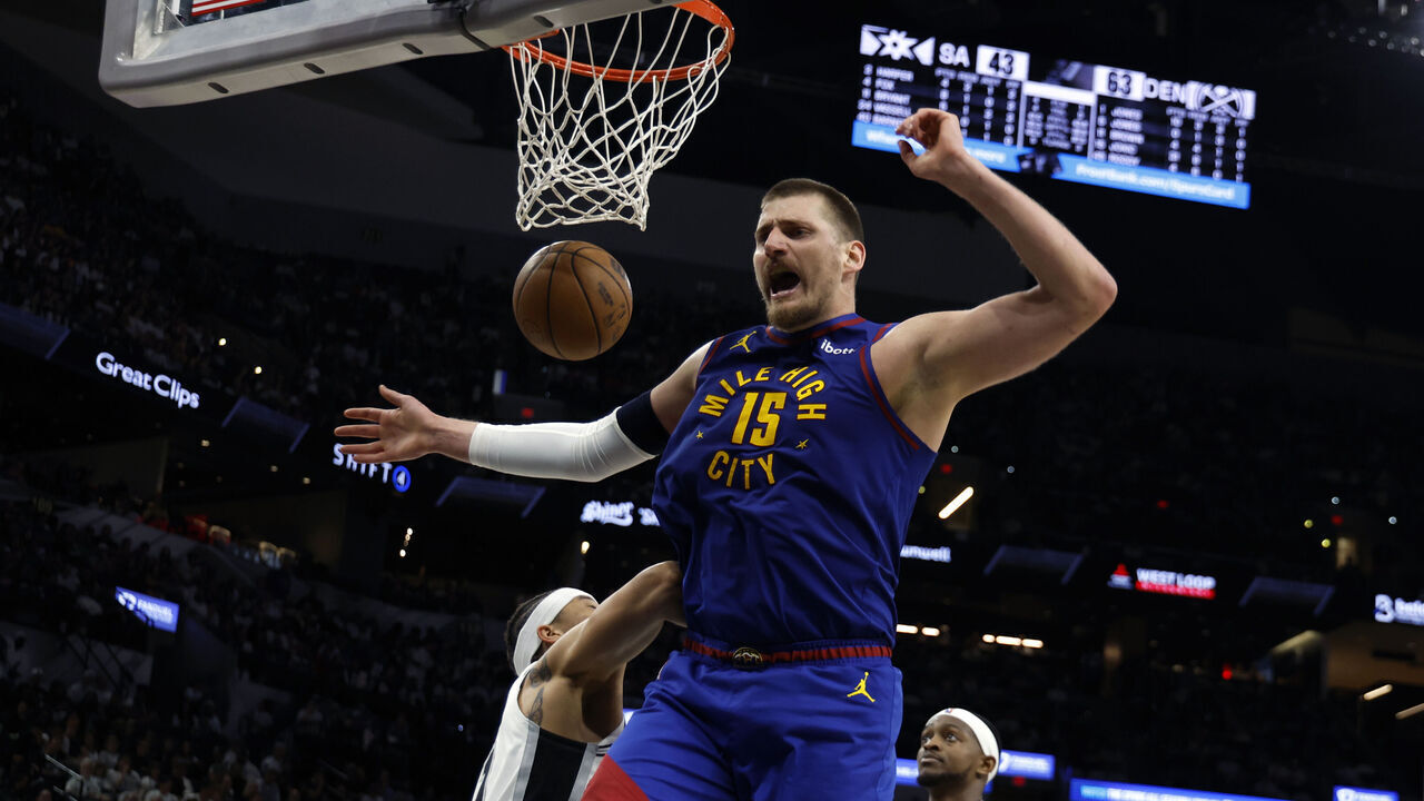 SAN ANTONIO, TX -APRIL 12: Nikola Jokic #15 of the Denver Nuggets reacts after a dunk against the San Antonio Spurs in the first half at Frost Bank Center on April 12, 2026 in San Antonio, Texas. NOTE TO USER: User expressly acknowledges and agrees that, by downloading and or using this photograph, User is consenting to terms and conditions of the Getty Images License Agreement.