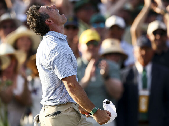AUGUSTA, GEORGIA - APRIL 12: Rory McIlroy of Northern Ireland celebrates winning the 2026 Masters Tournament on the 18th green at Augusta National Golf Club on April 12, 2026 in Augusta, Georgia.