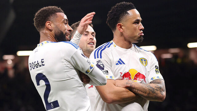 MANCHESTER, ENGLAND - APRIL 13: Noah Okafor of Leeds United celebrates scoring his team's second goal with Jayden Bogle during the Premier League match between Manchester United and Leeds United at Old Trafford on April 13, 2026 in Manchester, England.