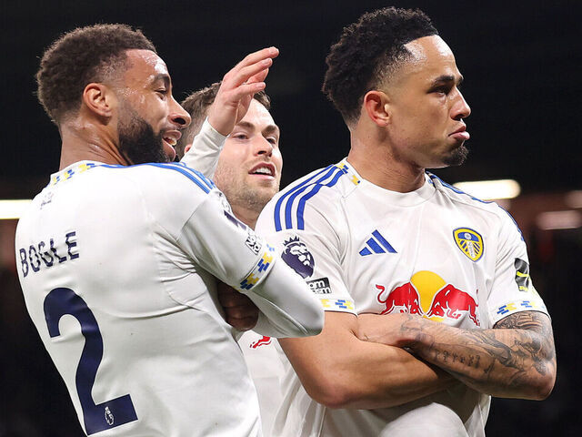 MANCHESTER, ENGLAND - APRIL 13: Noah Okafor of Leeds United celebrates scoring his team's second goal with Jayden Bogle during the Premier League match between Manchester United and Leeds United at Old Trafford on April 13, 2026 in Manchester, England.