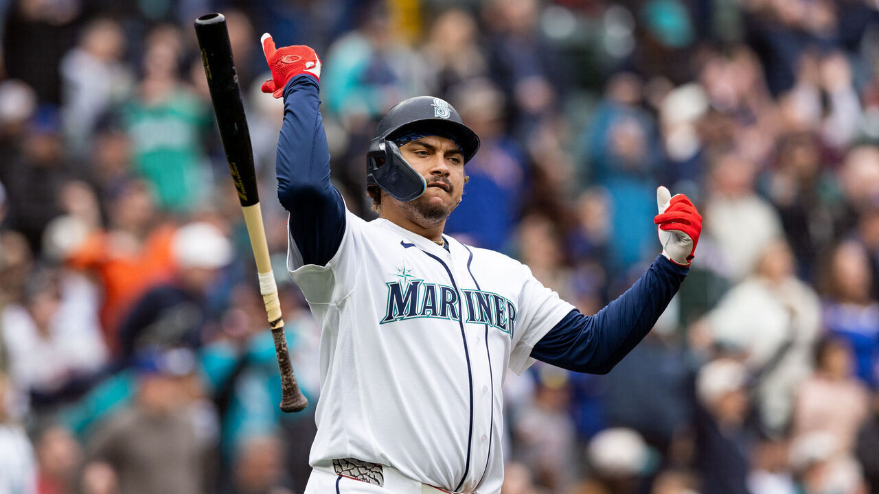 SEATTLE, WASHINGTON - APRIL 13: Josh Naylor #12 of the Seattle Mariners reacts after hitting a two-run home run during the third inning against the Houston Astros at T-Mobile Park on April 13, 2026 in Seattle, Washington.