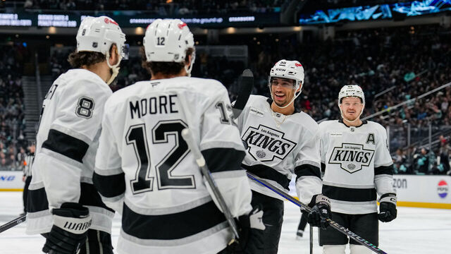 SEATTLE, WASHINGTON - APRIL 13: Quinton Byfield #55 reacts after a goal is scored by Trevor Moore #12 of the Los Angeles Kings during the second period of a game against the Seattle Kraken at Climate Pledge Arena on April 13, 2026 in Seattle, Washington.