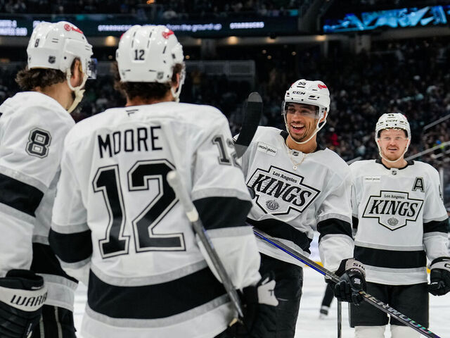 SEATTLE, WASHINGTON - APRIL 13: Quinton Byfield #55 reacts after a goal is scored by Trevor Moore #12 of the Los Angeles Kings during the second period of a game against the Seattle Kraken at Climate Pledge Arena on April 13, 2026 in Seattle, Washington.