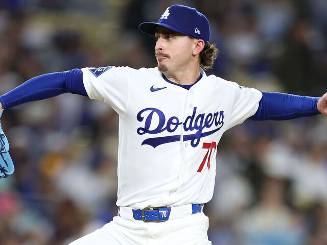 LOS ANGELES, CALIFORNIA - APRIL 13: Justin Wrobleski #70 of the Los Angeles Dodgers pitches during the second inning of a game against the New York Mets at Dodger Stadium on April 13, 2026 in Los Angeles, California.