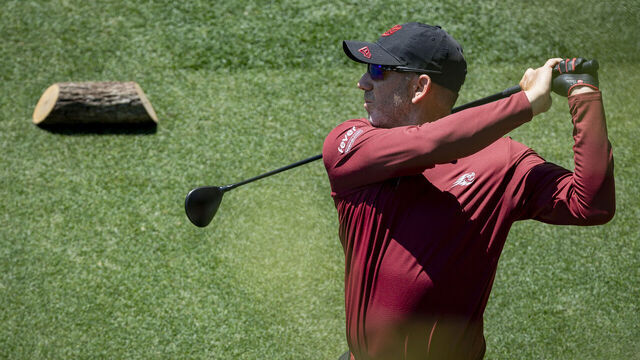 Masters champion Sergio Garcia of Spain plays a stroke from the No. 14 tee during the final round of the Masters at Augusta National Golf Club, Sunday, April 12, 2026.