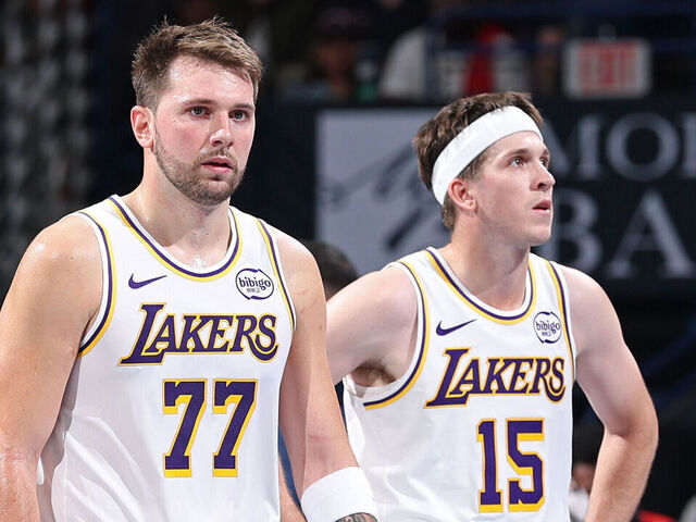 NEW ORLEANS, LA - NOVEMBER 14: Luka Doncic #77 and Austin Reaves #15 of the Los Angeles Lakers look on during the game against the New Orleans Pelicans during the 2025 - 2026 Emirates Cup Game on November 14, 2025 at the Smoothie King Center in New Orleans, Louisiana. Mandatory Copyright Notice: Copyright 2025 NBAE