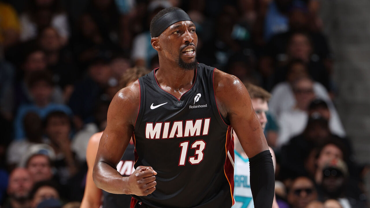CHARLOTTE, NC - APRIL 14: Bam Adebayo #13 of the Miami Heat celebrates during the game against the Charlotte Hornets during the Play-In Tournament on April 14, 2026 at Spectrum Center in Charlotte, North Carolina. Mandatory Copyright Notice: Copyright 2026 NBAE