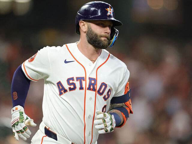 HOUSTON, TEXAS - APRIL 14: Christian Walker #8 of the Houston Astros runs the bases after hitting a solo home run during the second inning against the Colorado Rockies at Daikin Park on April 14, 2026 in Houston, Texas.