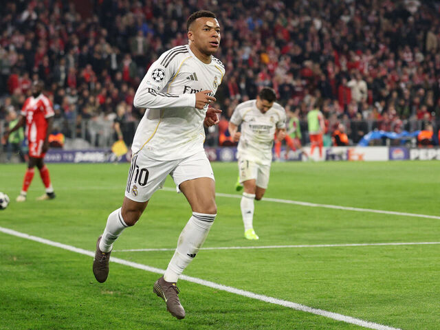 MUNICH, GERMANY - APRIL 15: Kylian Mbappe of Real Madrid celebrates scoring his team's third goal during the UEFA Champions League 2025/26 Quarter-Final Second Leg match between FC Bayern München and Real Madrid CF at Football Arena Munich on April 15, 2026 in Munich, Germany.