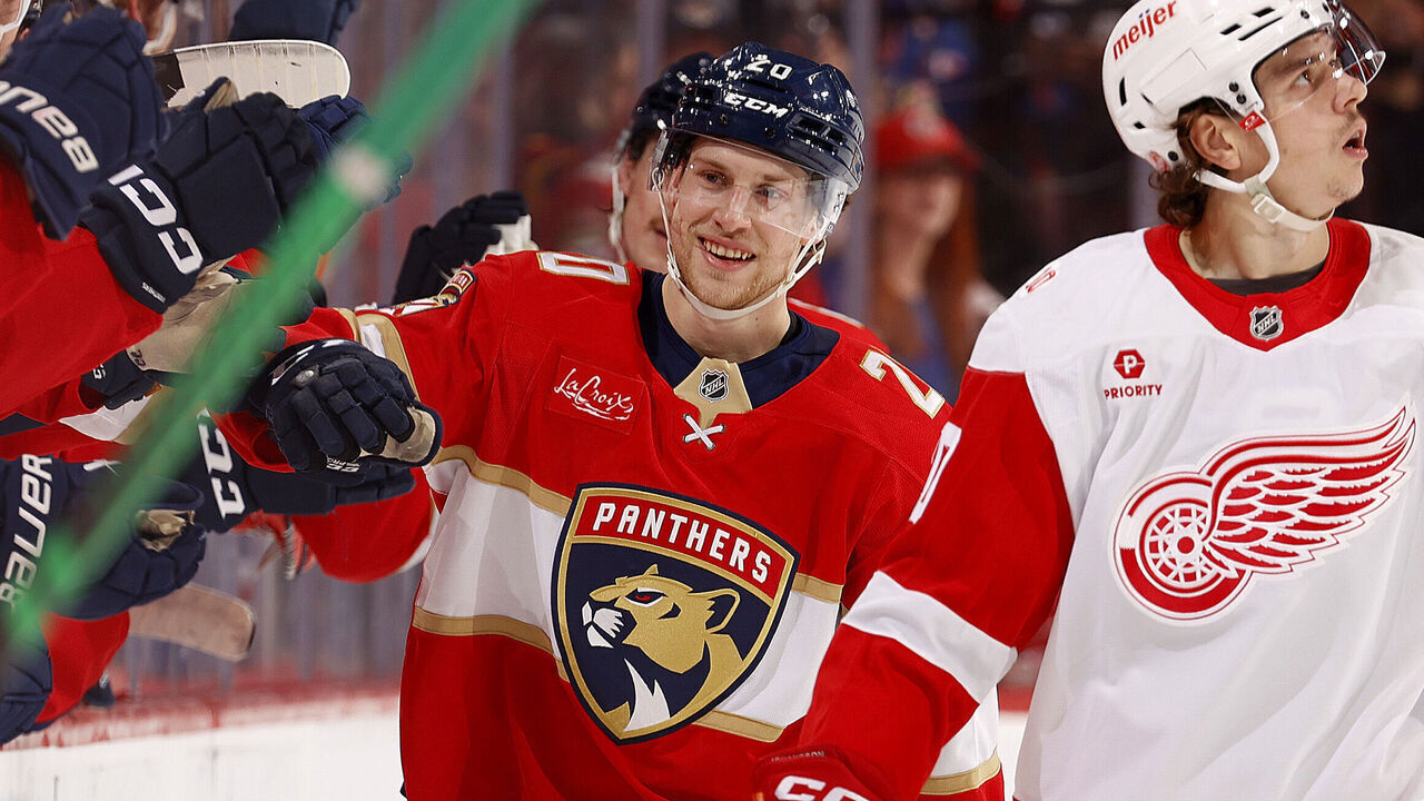 SUNRISE, FLORIDA - APRIL 15: Mike Benning #20 of the Florida Panthers celebrates his goal with teammates against the Detroit Red Wings at the Amerant Bank Arena on April 15, 2026 in Sunrise, Florida.
