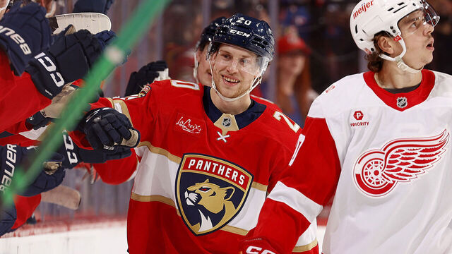 SUNRISE, FLORIDA - APRIL 15: Mike Benning #20 of the Florida Panthers celebrates his goal with teammates against the Detroit Red Wings at the Amerant Bank Arena on April 15, 2026 in Sunrise, Florida.