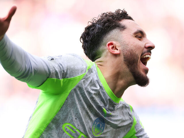 LONDON, ENGLAND - APRIL 12: Rayan Cherki of Manchester City celebrates during the Premier League match between Chelsea and Manchester City at Stamford Bridge on April 12, 2026 in London, England.
