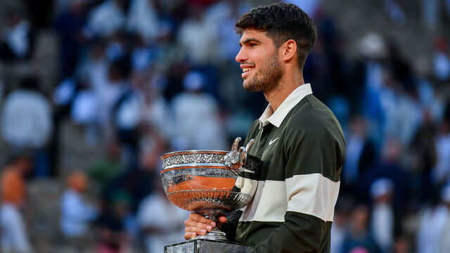 PARIS, FRANCE - JUNE 08: Carlos Alcaraz of Spain holds the Coupe des Mousquetaires trophy following his victory over Jannik Sinner of Italy during the Men’s Singles Final match on Day Fifteen of the 2025 French Open at Roland Garros on June 08, 2025 in Paris, France.