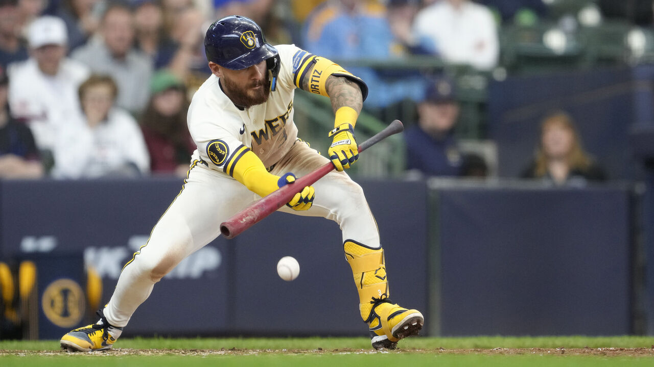 MILWAUKEE, WISCONSIN - APRIL 16: Joey Ortiz #3 of the Milwaukee Brewers hits a RBI sacrifice bunt against the Toronto Blue Jays during the seventh inning at American Family Field on April 16, 2026 in Milwaukee, Wisconsin.