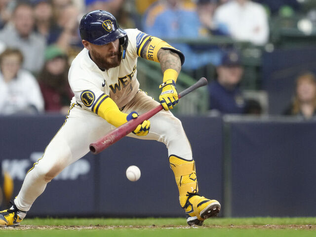MILWAUKEE, WISCONSIN - APRIL 16: Joey Ortiz #3 of the Milwaukee Brewers hits a RBI sacrifice bunt against the Toronto Blue Jays during the seventh inning at American Family Field on April 16, 2026 in Milwaukee, Wisconsin.