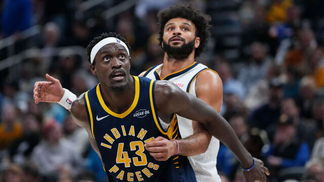 INDIANAPOLIS, INDIANA - DECEMBER 03: Pascal Siakam #43 of the Indiana Pacers and Jamal Murray #27 of the Denver Nuggets compete for a rebound in the third quarter at Gainbridge Fieldhouse on December 03, 2025 in Indianapolis, Indiana.