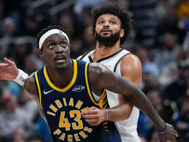 INDIANAPOLIS, INDIANA - DECEMBER 03: Pascal Siakam #43 of the Indiana Pacers and Jamal Murray #27 of the Denver Nuggets compete for a rebound in the third quarter at Gainbridge Fieldhouse on December 03, 2025 in Indianapolis, Indiana.
