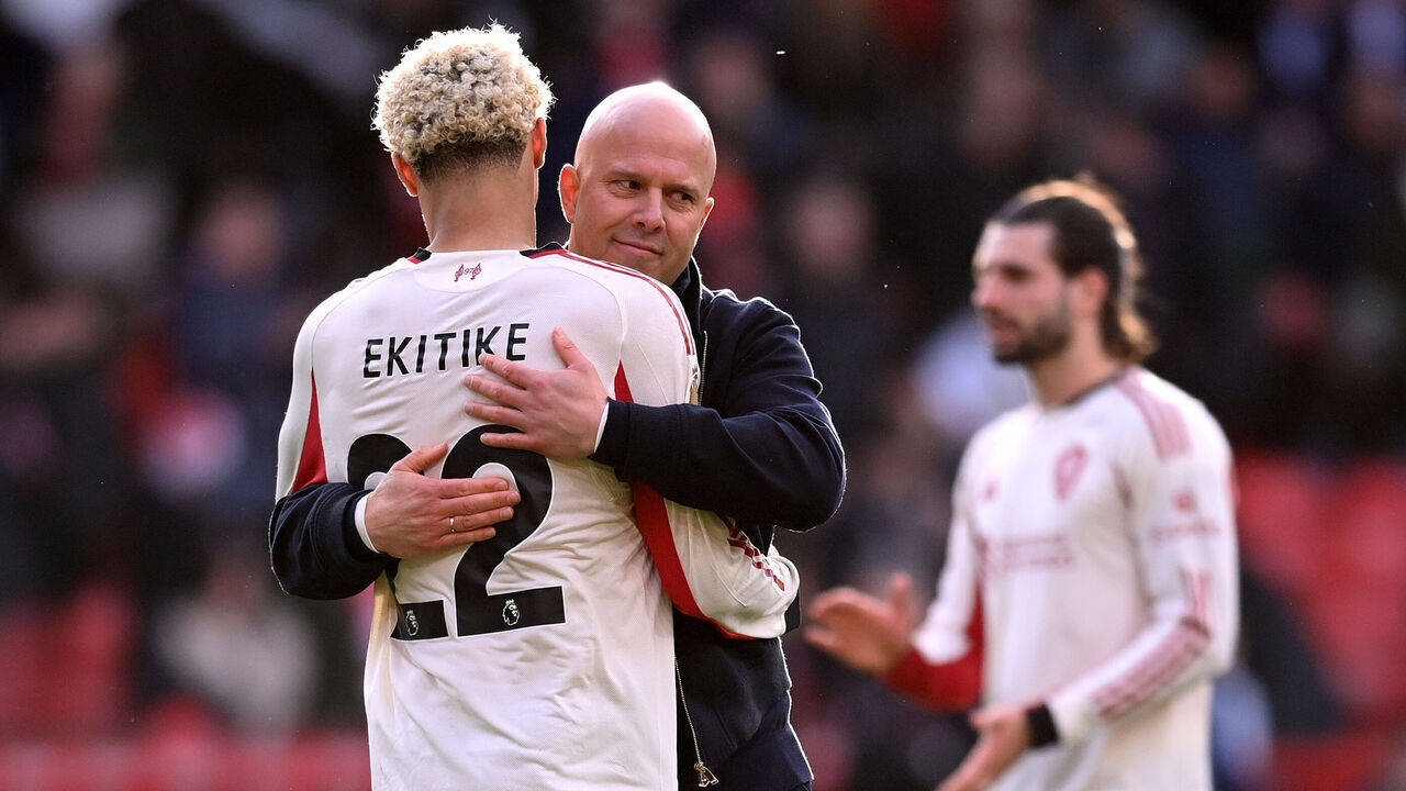 NOTTINGHAM, ENGLAND - FEBRUARY 22: Hugo Ekitike of Liverpool and Arne Slot, head coach of Liverpool, following the Premier League match between Nottingham Forest and Liverpool at City Ground on February 22, 2026 in Nottingham, England.