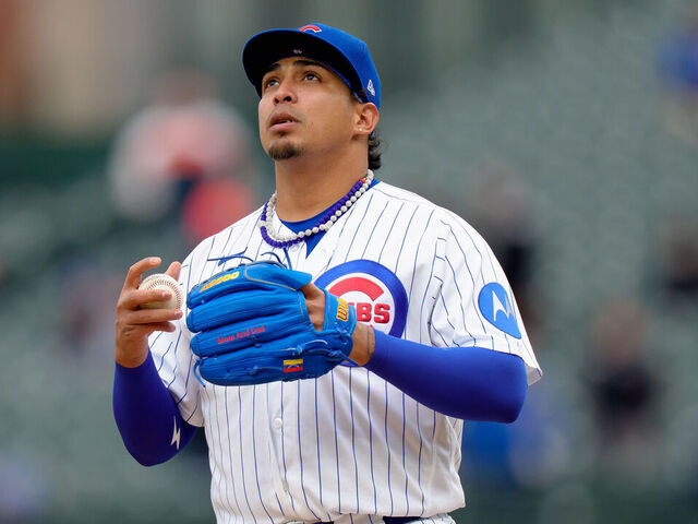 CHICAGO, ILLINOIS - APRIL 1: Daniel Palencia #48 of the Chicago Cubs pitches in a game against the Los Angeles Angels at Wrigley Field on April 1, 2026 in Chicago, Illinois.