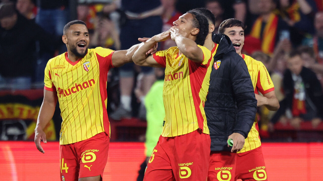 Lens' French defender Pierre Ismaelo Ganiou (C) celebrates with teammates after scoring a goal during the French L1 football match between RC Lens and Toulouse FC at the Stade Bollaert-Delelis in Lens, northern France, on April 17, 2026.