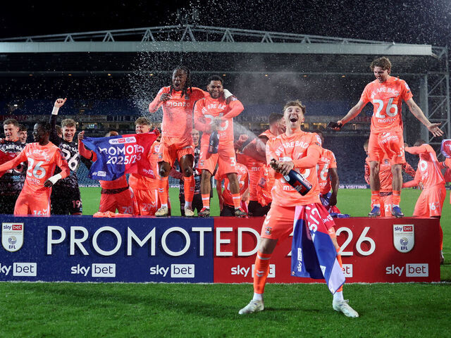 BLACKBURN, ENGLAND - APRIL 17: The Coventry City team celebrate their promotion following the Sky Bet Championship match between Blackburn Rovers and Coventry City at Ewood Park on April 17, 2026 in Blackburn, England.