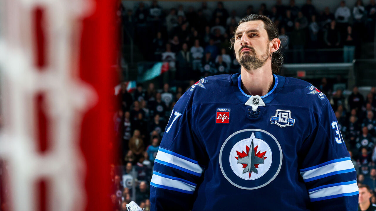 WINNIPEG, CANADA - MARCH 26: Goaltender Connor Hellebuyck #37 of the Winnipeg Jets looks on prior to NHL action against the Colorado Avalanche at Canada Life Centre on March 26, 2026 in Winnipeg, Manitoba, Canada.