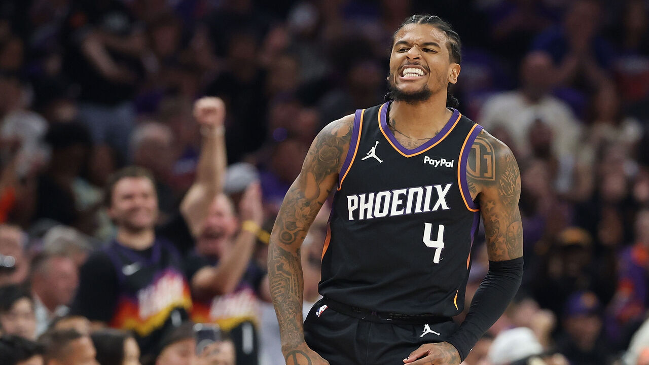 PHOENIX, ARIZONA - APRIL 17: Jalen Green #4 of the Phoenix Suns reacts to a three-point shot against the Golden State Warriors during the first half of an NBA play-in tournament game at Mortgage Matchup Center on April 17, 2026 in Phoenix, Arizona.