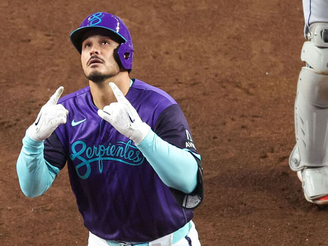 PHOENIX, AZ - APRIL 17: Nolan Arenado #28 of the Arizona Diamondbacks celebrates at home plate after hitting a solo home run in the fourth inning during the game between the Toronto Blue Jays and the Arizona Diamondbacks at Chase Field on Friday, April 17, 2026 in Phoenix, Arizona.