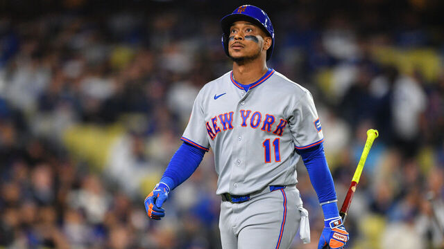 LOS ANGELES, CA - APRIL 14: New York Mets designated hitter Jorge Polanco (11) walks back to the dugout after striking out during the MLB game between the New York Mets and the Los Angeles Dodgers on April 14, 2026 at Dodger Stadium in Los Angeles, CA.